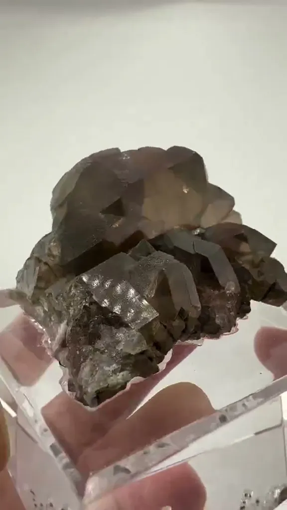 Discover the breathtaking beauty of Smoky Quartz Gwindel Cluster from… - image 2