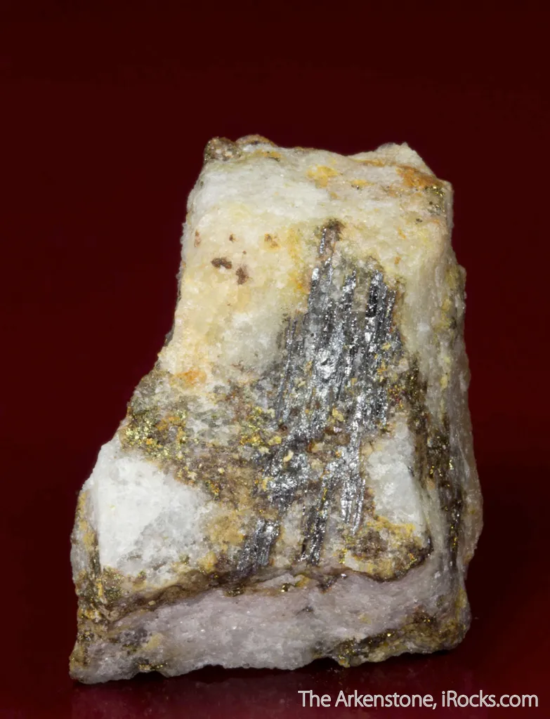 Eclarite (type locality) with Chalcopyrite on Quartz image