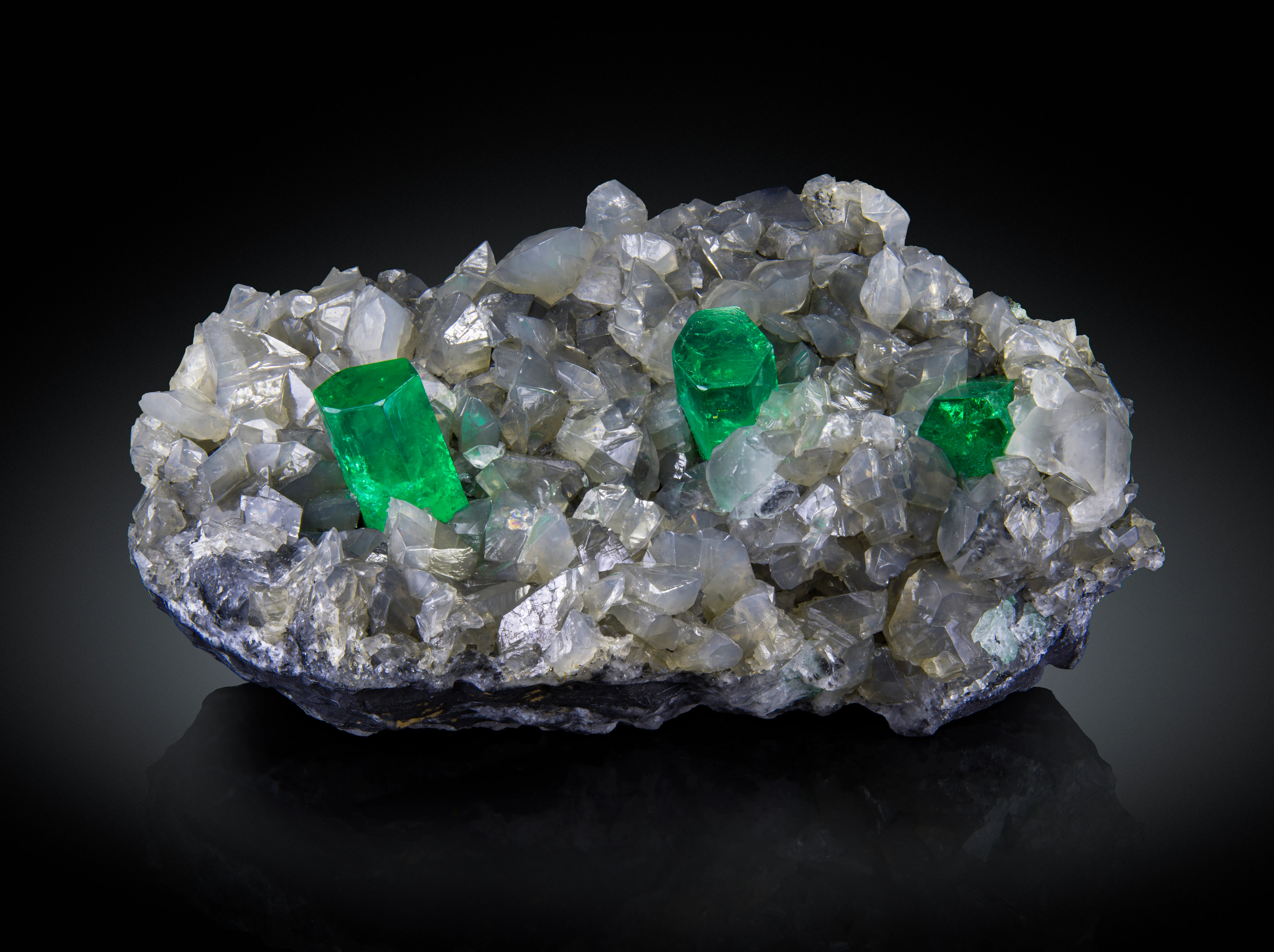 Emerald on Calcite - image 1