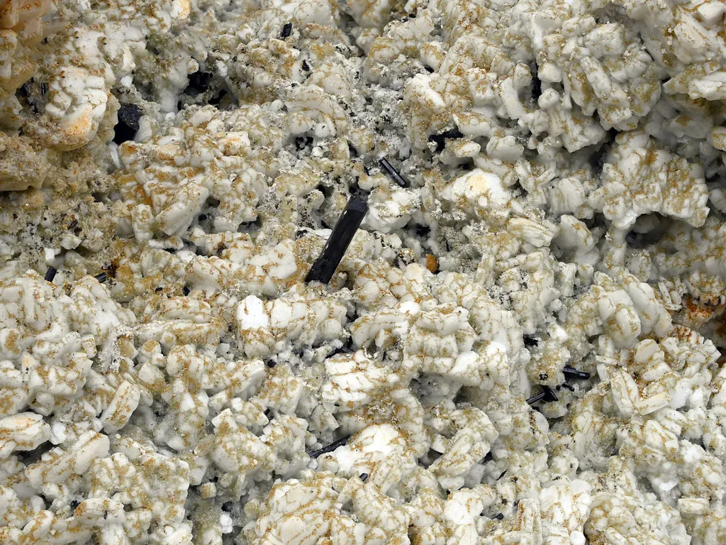 Feldspar with Quartz and Schorl Spray on Matrix from Pakistan image