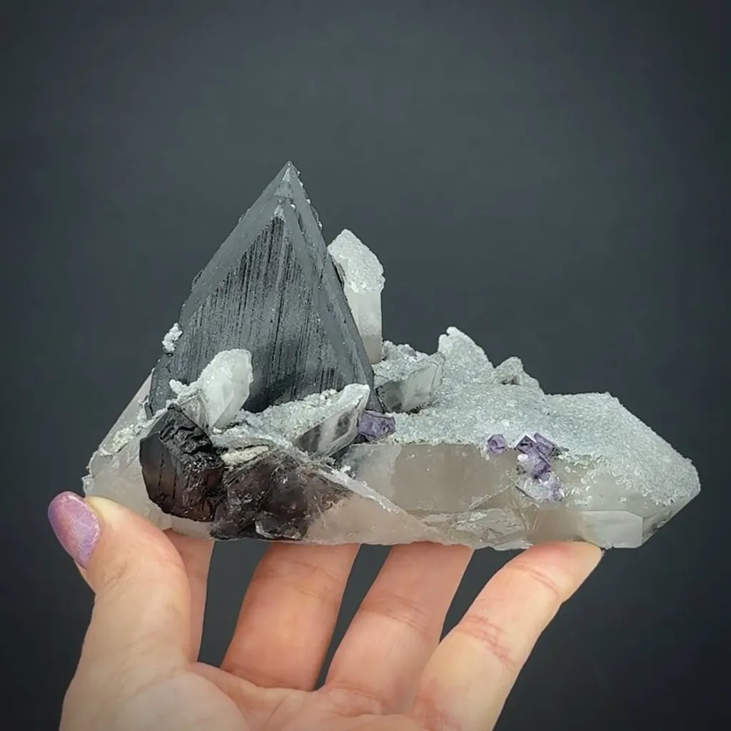 Ferberite on Quartz with Fluorite image