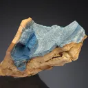 FERROSTRUNZITE on Vivianite - image 1