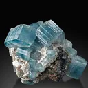 Fluorapatite, gemmy, pale blue crystals on Calcite - image 1