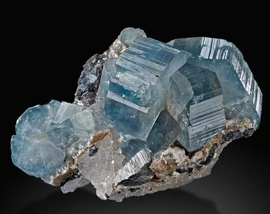 Fluorapatite, gemmy, pale blue crystals on Calcite - image 2
