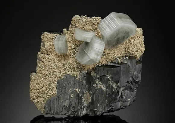 Fluorapatite on Ferberite with Siderite - image 1