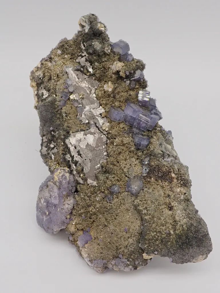 Fluorapatite with Arsenopyrite and Fluorite image