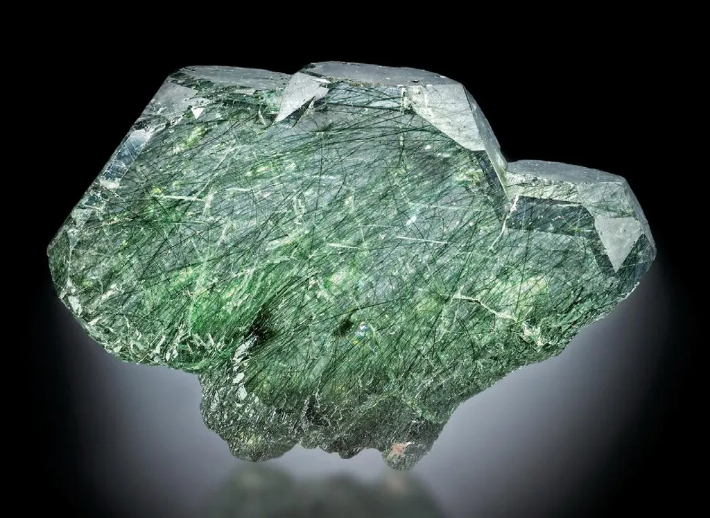 Fluorapatite with byssolite image