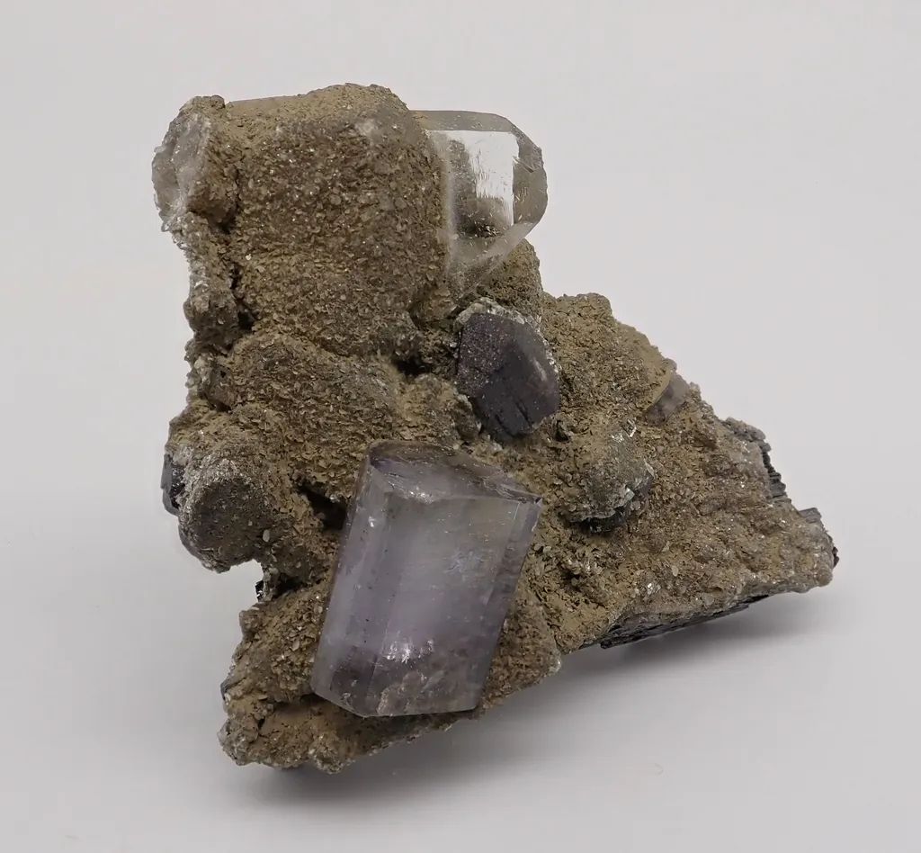 Fluorapatite with Ferberite and Cassiterite image