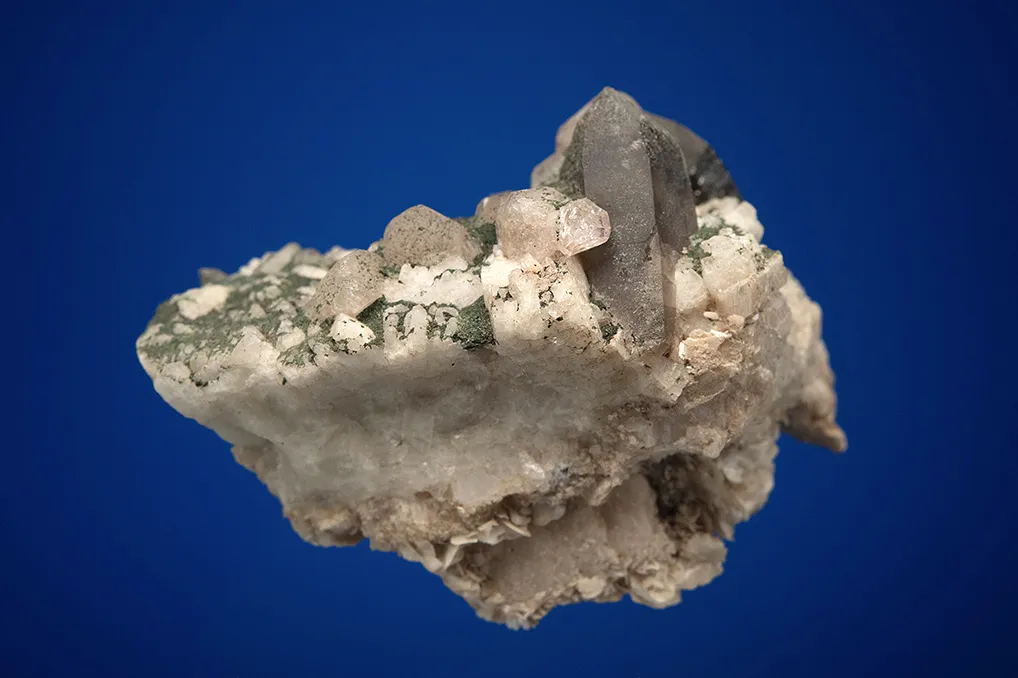 Fluorapatite with Quartz var. Smoky on Microcline - image 3