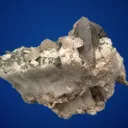 Fluorapatite with Quartz var. Smoky on Microcline - image 3