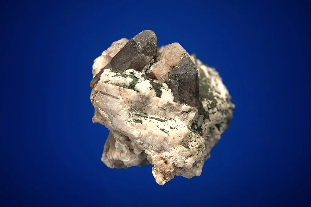 Fluorapatite with Quartz var. Smoky on Microcline - image 5