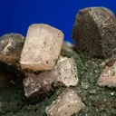 Fluorapatite with Quartz var. Smoky on Microcline - image 2