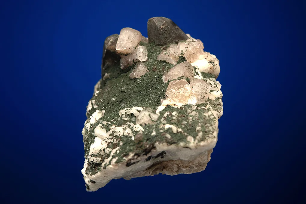 Fluorapatite with Quartz var. Smoky on Microcline - image 4