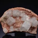 FLUORAPOPHYLLITE-(K) with Natrolite on Heulandite - image 1