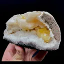 Fluorescent Powellite with Stilbite Inside Heuladnite Geode - image 3