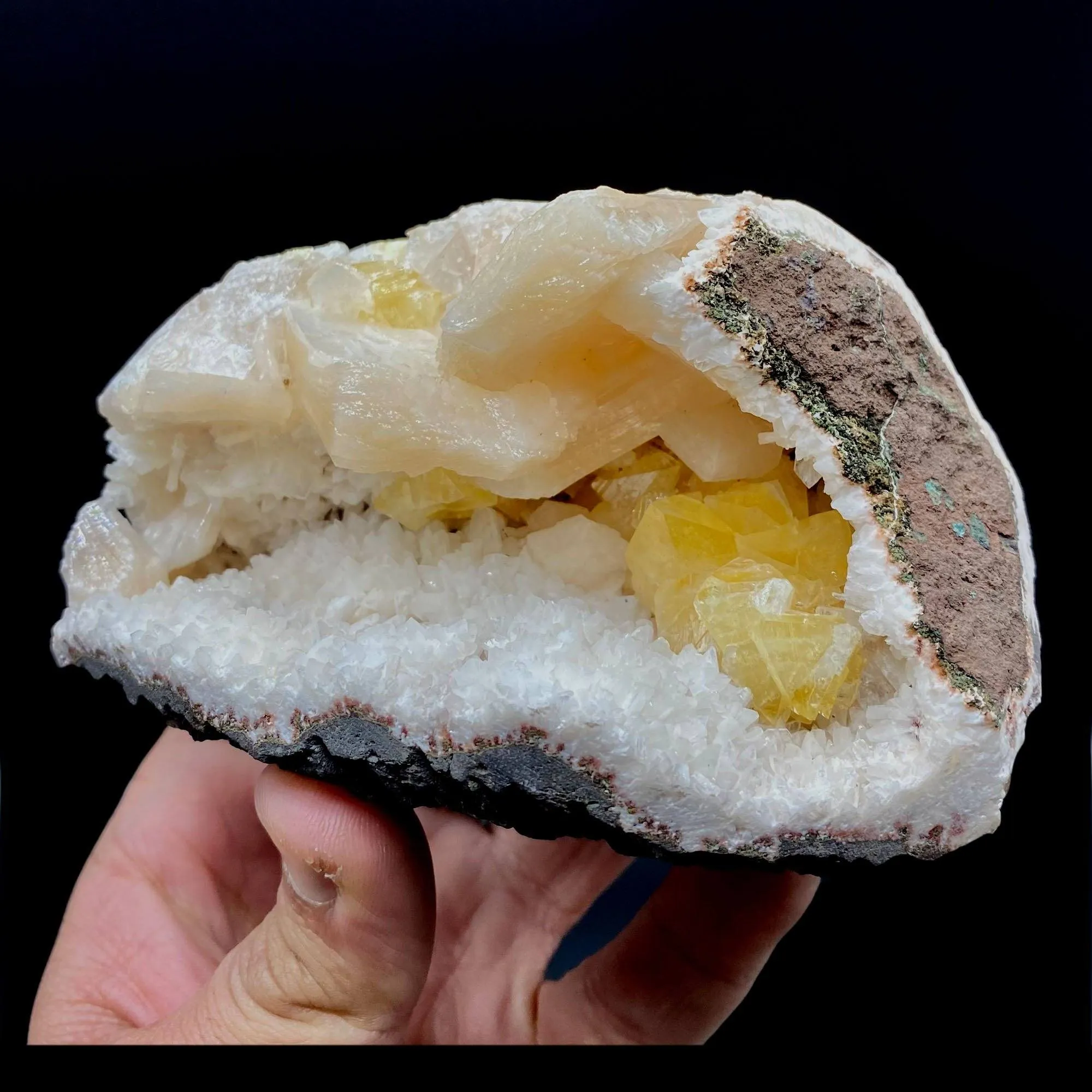 Fluorescent Powellite with Stilbite Inside Heuladnite Geode - image 3