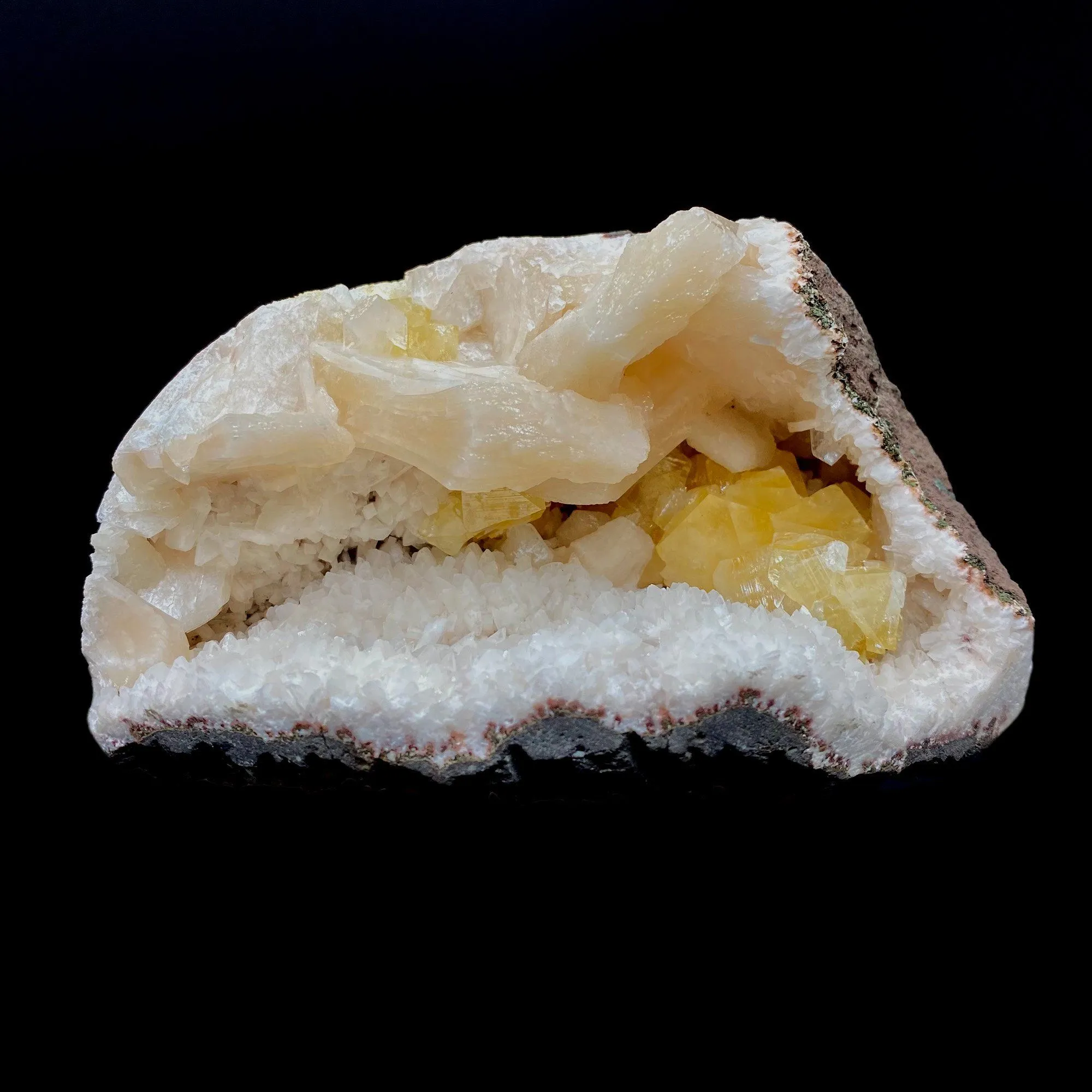 Fluorescent Powellite with Stilbite Inside Heuladnite Geode - image 1