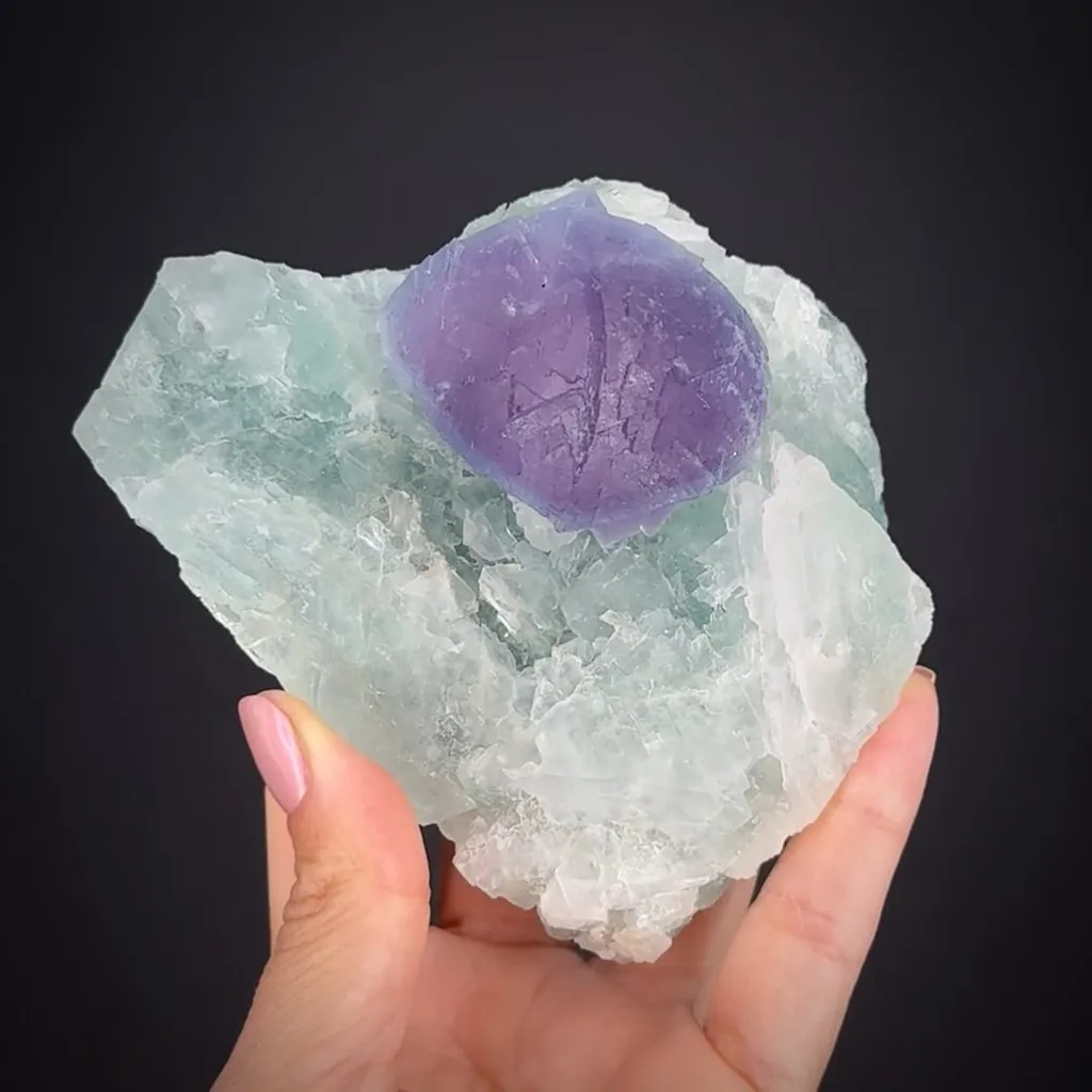 Fluorite (curved crystal habit) on Fluorite