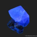 Fluorite (fl) with Ferberite (?) inclusions, on Cassiterite with Chalcopyrite and Scheelite - image 7