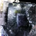 Fluorite included with Bismuthinite on Quartz - image 7