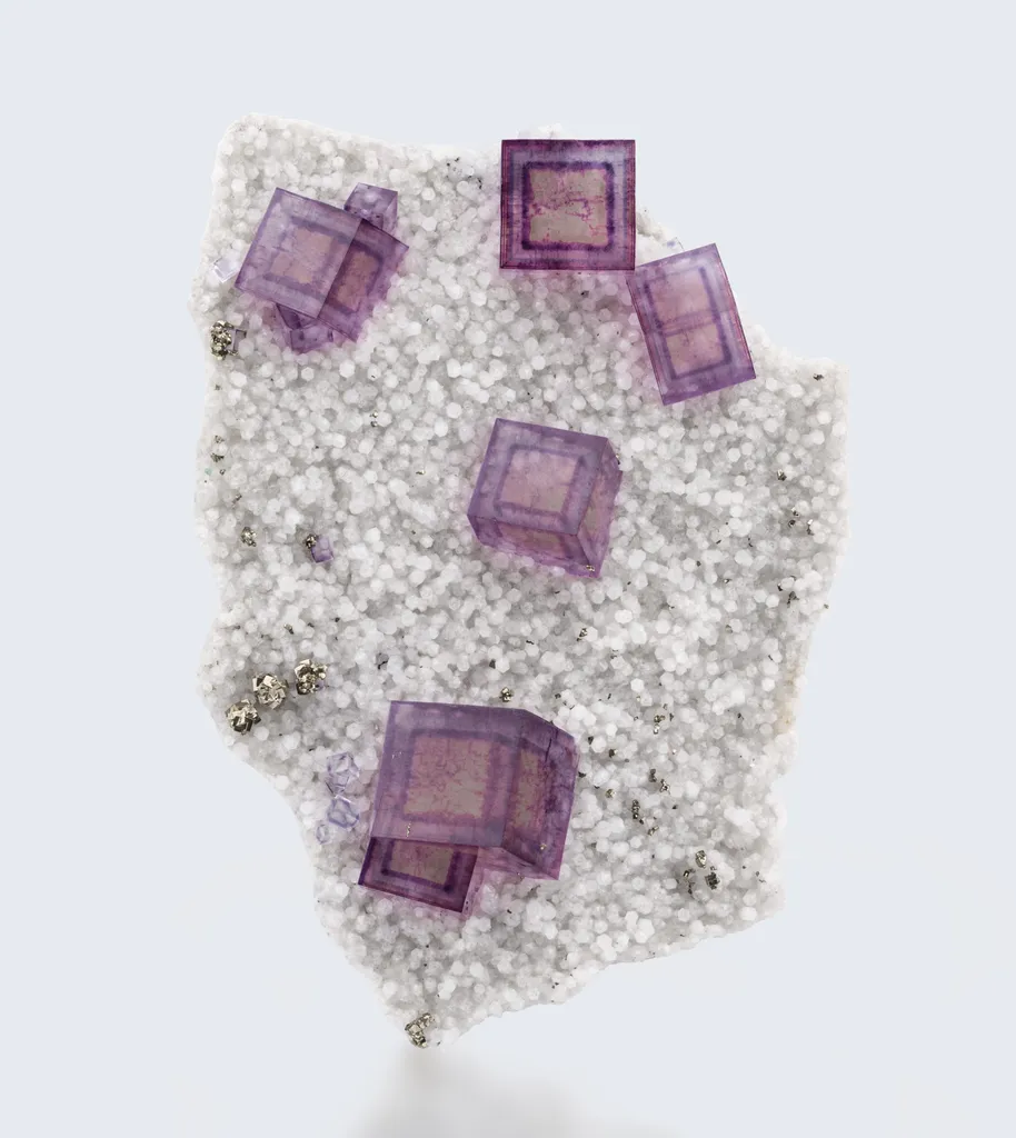 Fluorite on quartz with chalcopyrite, China, Hunan, Yaogangxian Mine image
