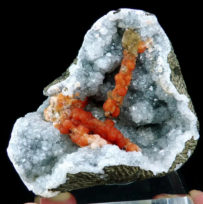 Fluorite, Orangish-red, boytroidal with calcite crystal and blue quartz image