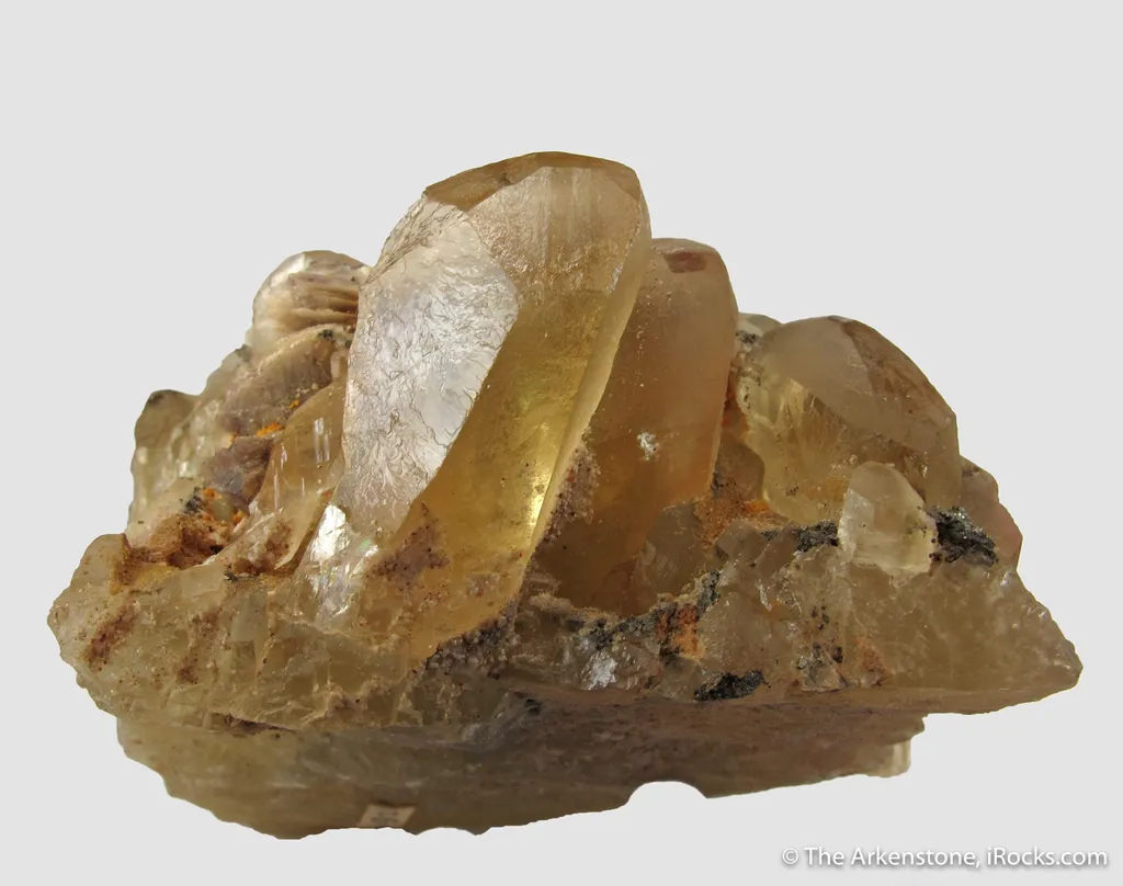 Fluorite (twinned) included by Cinnabar, with Pyrite - illustrated image
