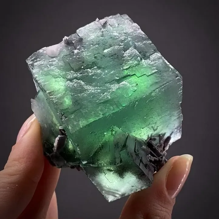 Fluorite with Ferberite inclusions image