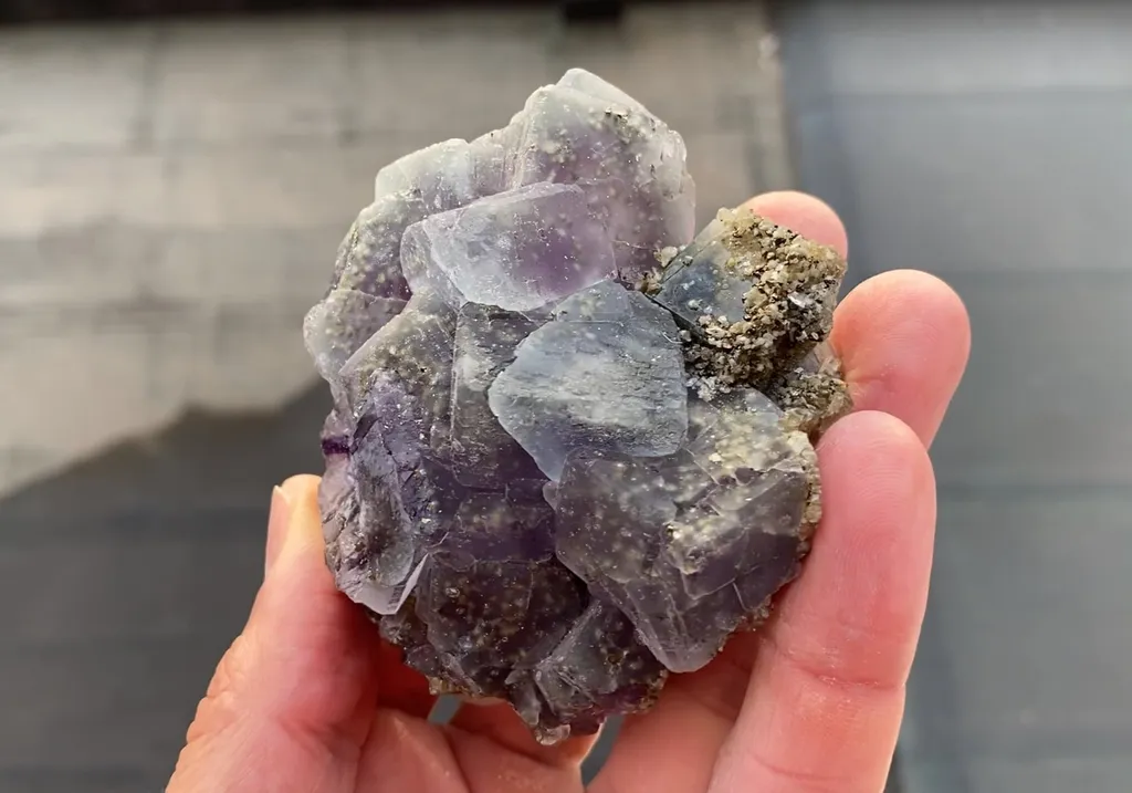 Fluorite with Fluorapatite and Pyrite inclusions image