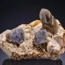 Fluorite with Smoky Quartz on Microcline - image 1
