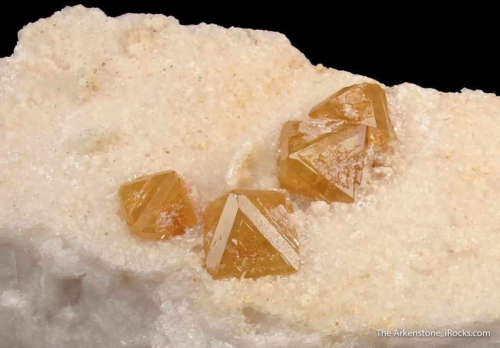 Fluornatromicrolite on Feldspar image