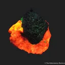 Foliated Zincite on Calcite (fl), with Willemite (fl) - image 7