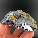 Galena after Pyrrhotite with Galena, Siderite, Chalcopyrite - image 1