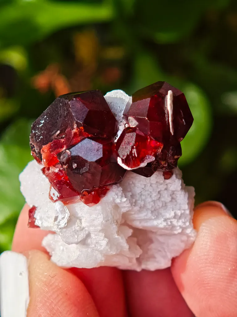 Garnet on Microcline from Skardu, Pakistan. Lustrous wine-red spessartine garnet crystals on matrix.  Great shape and amazing color contrast - image 4