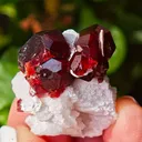 Garnet on Microcline from Skardu, Pakistan. Lustrous wine-red spessartine garnet crystals on matrix.  Great shape and amazing color contrast - image 4