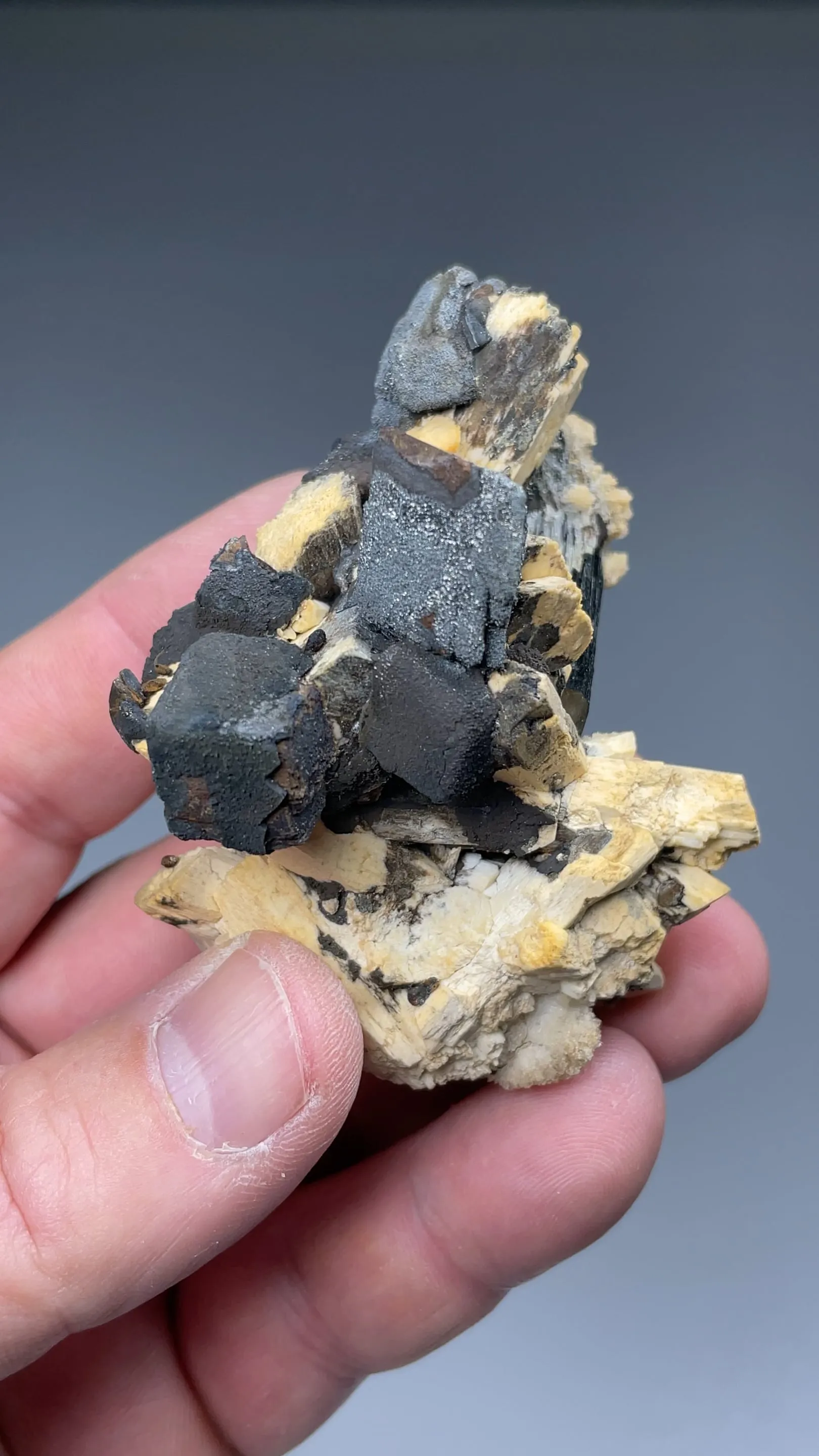 Goethite after Siderite with Hematite, Schorl, Microcline - image 2