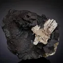 Goethite coating Cerussite after Anglesite with Cerussite - image 1