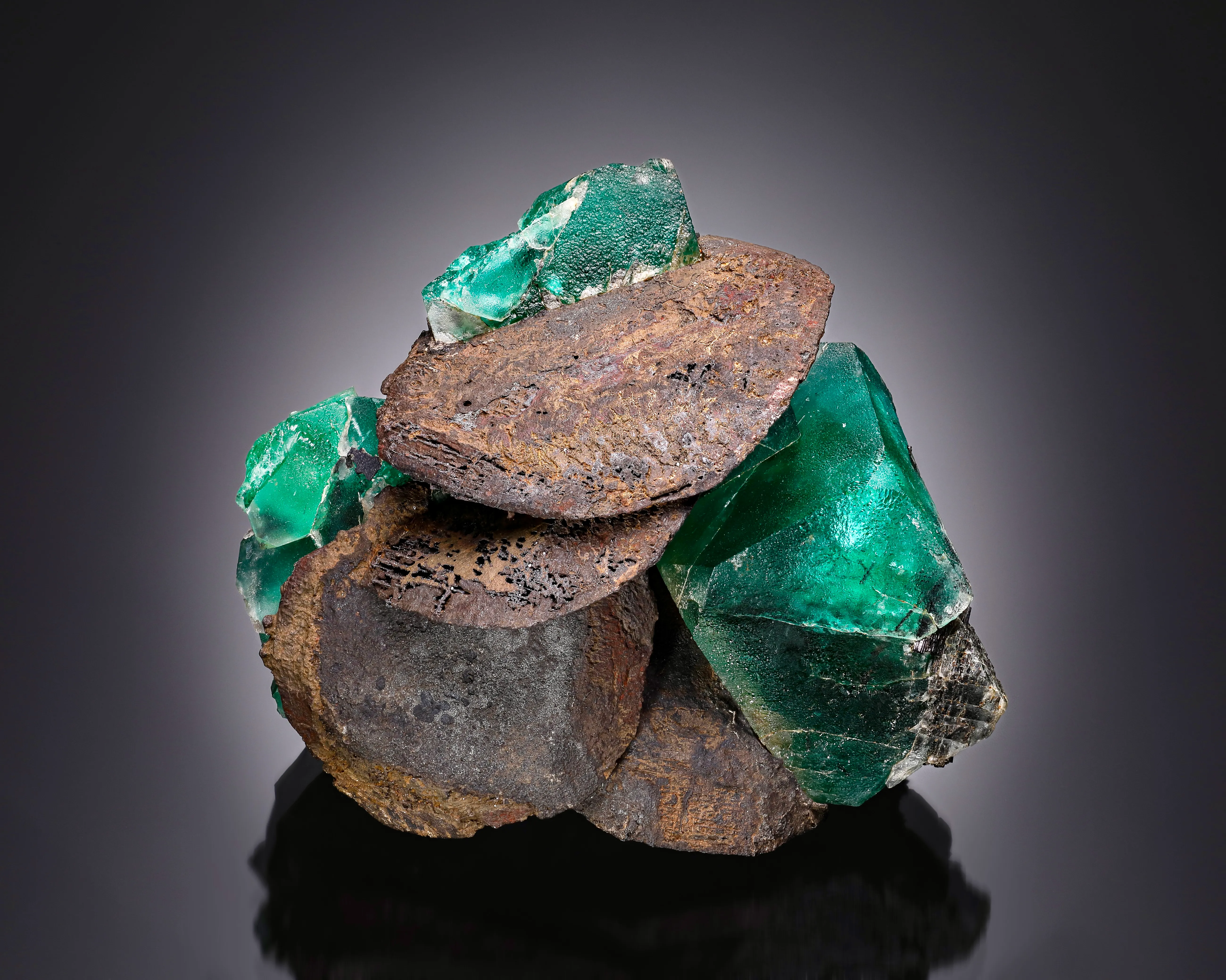 Goethite ps. Siderite on Fluorite - image 1