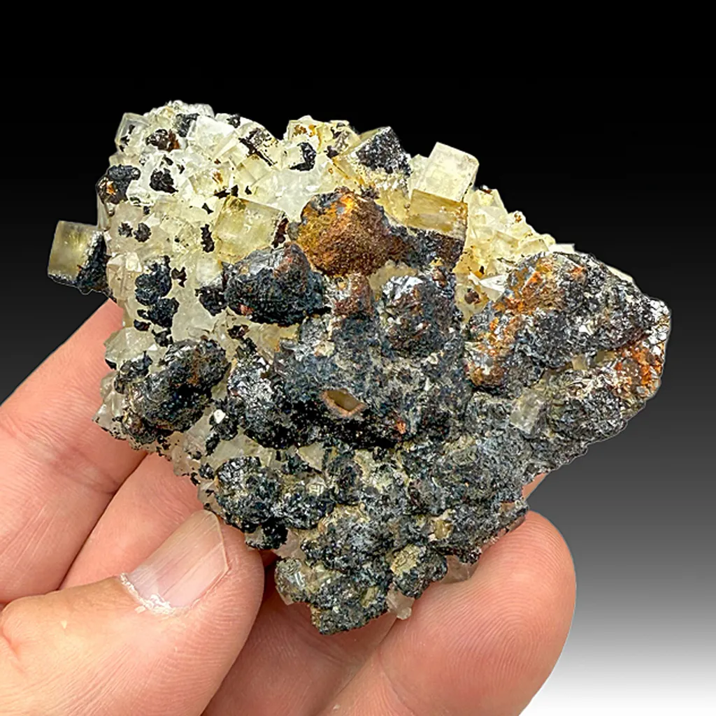 Goethite replacing Siderite on Quartz with Fluorite image