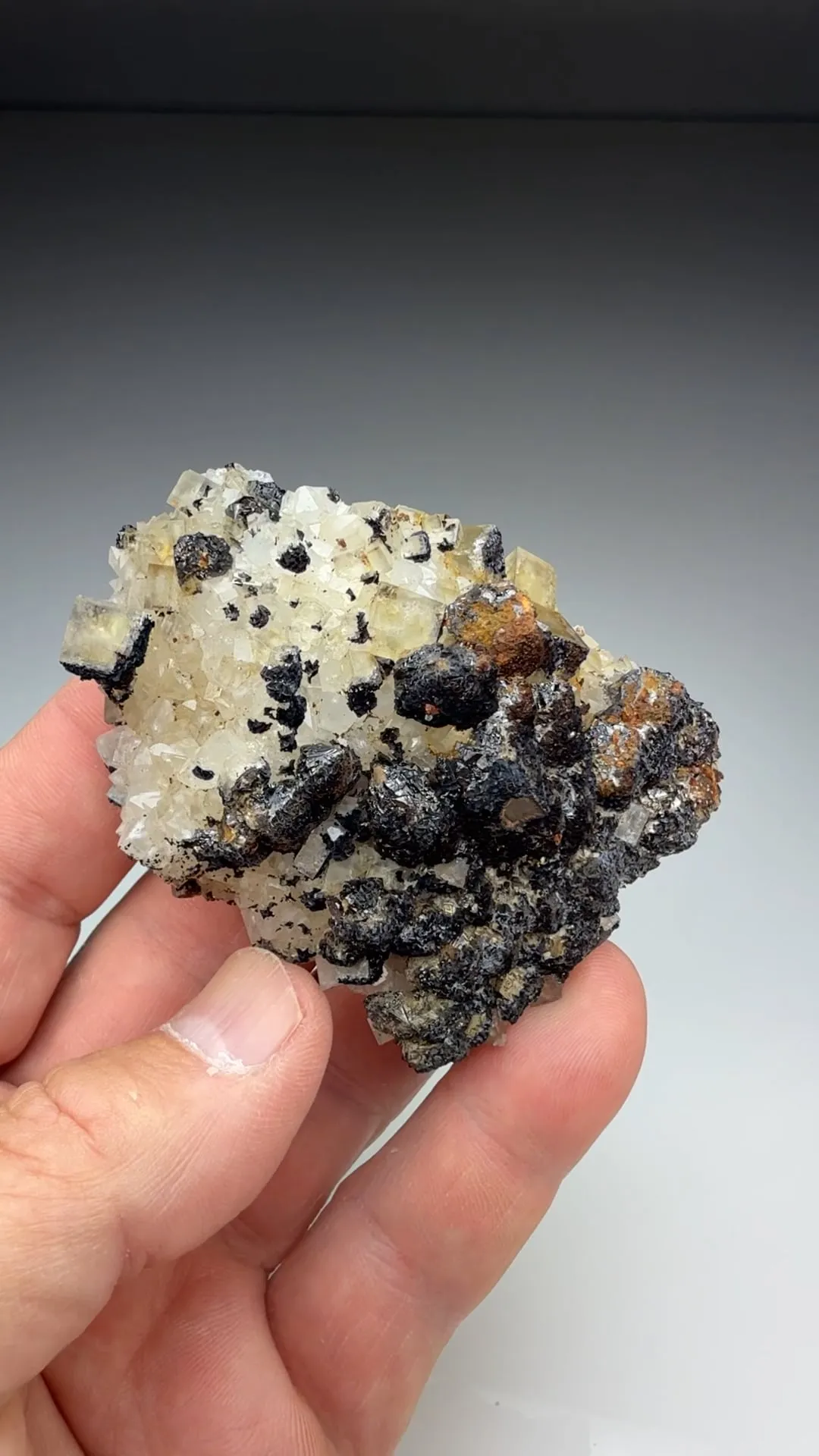 Goethite replacing Siderite on Quartz with Fluorite - image 2