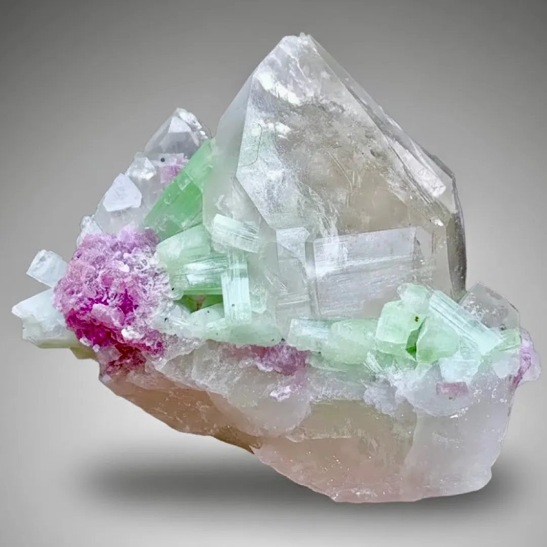 Green Tourmalines with Pink Lepidolite on Quartz from Afghanistan - image 1