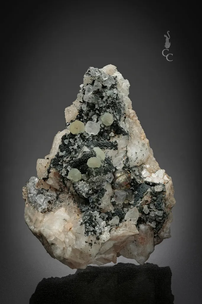 Greenockite with Prehnite and PUMPELLYITE image