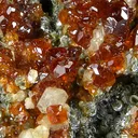 Grossular (Var: Hessonite), Clinochlore, Albite, Diopside - image 1