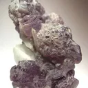 Hambergite on Lepidolite - image 1