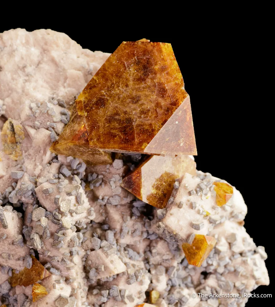 Helvine on Microcline with Muscovite image