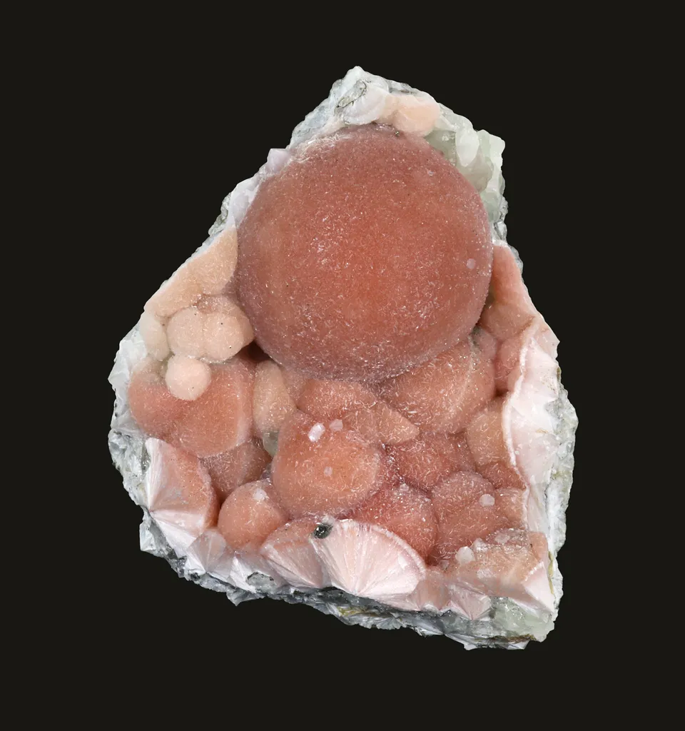 Hematite-stained pectolite with heulandite image