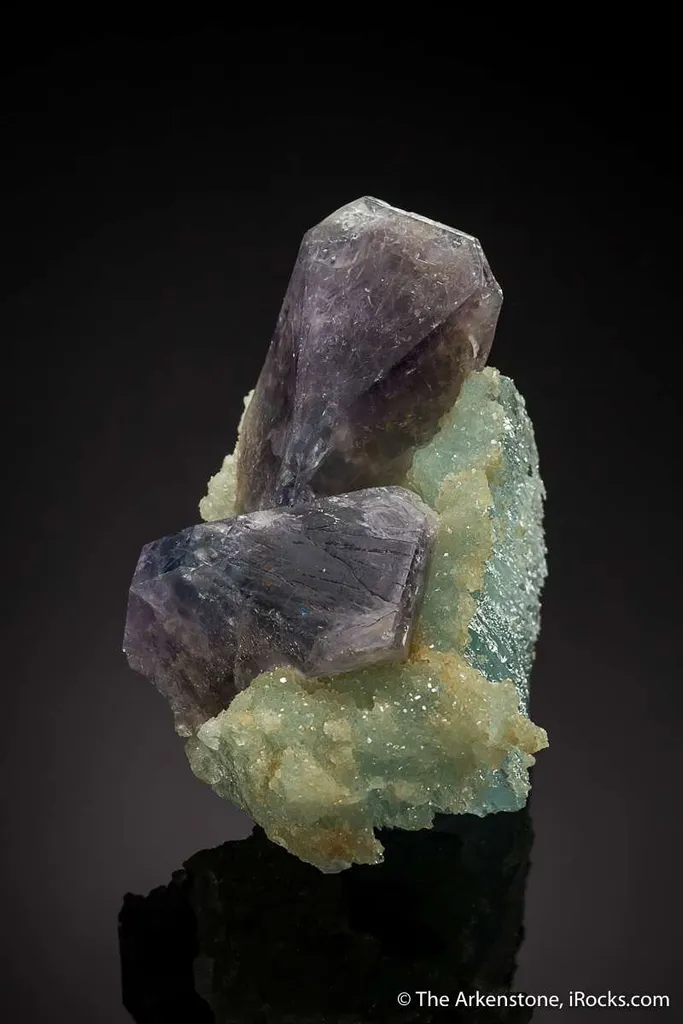 Herderite on Blue Topaz image