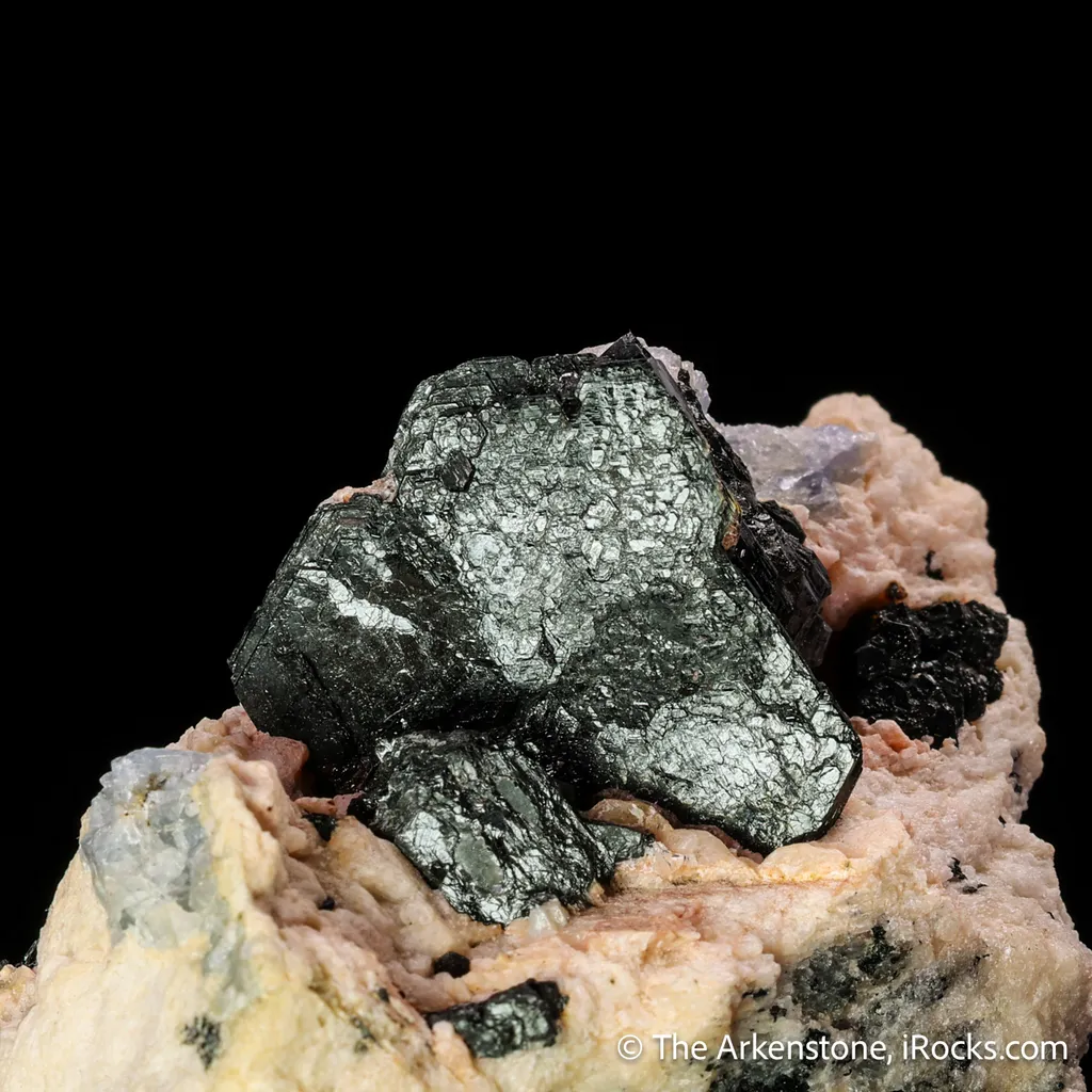 Hibonite in matrix