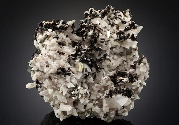 HUBEITE with Quartz Pyrite and Calcite image
