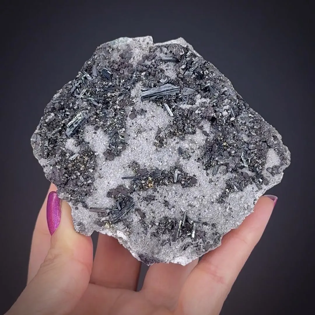 Hutchinsonite on matrix - image 2